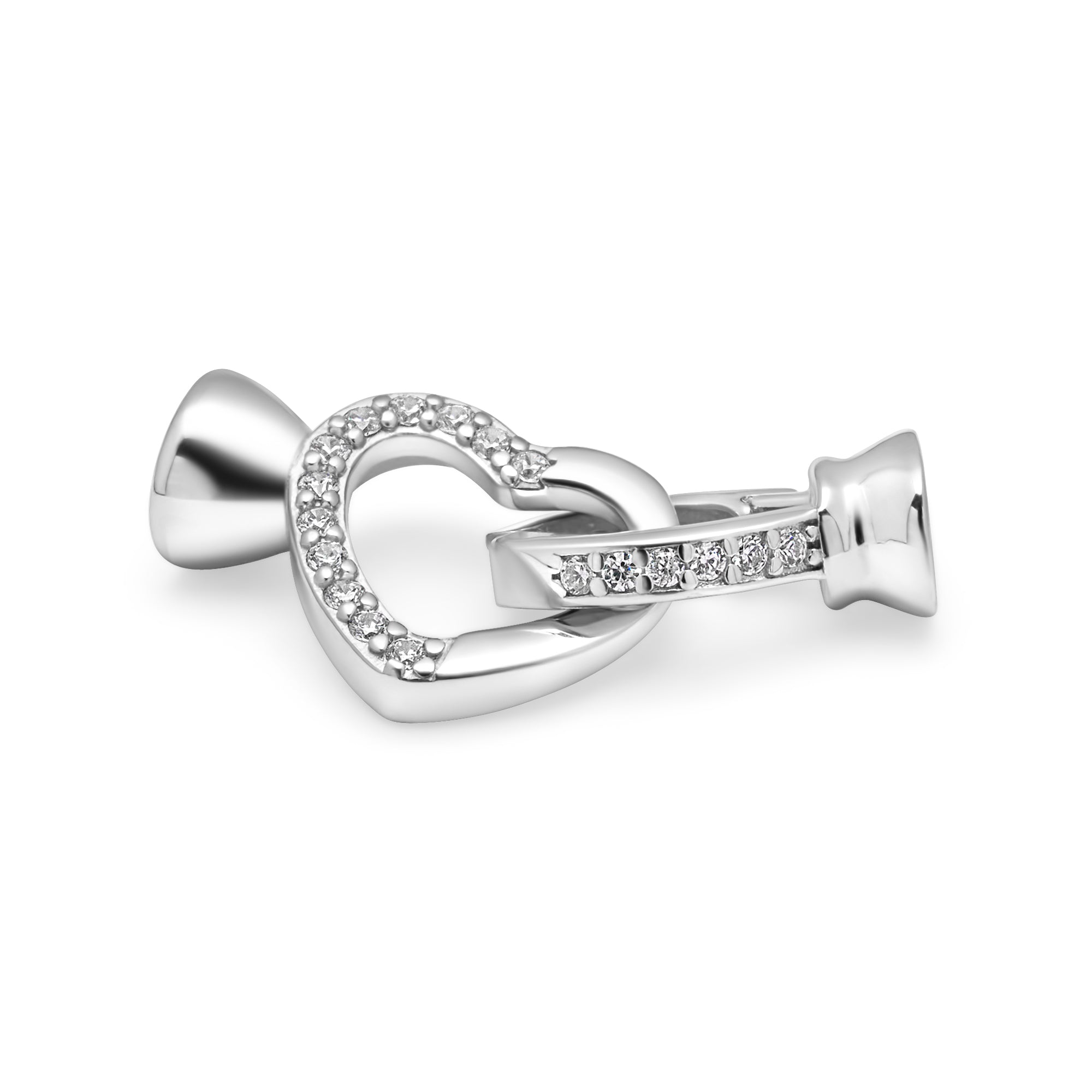 Silver bow-shaped jewelry charm with heart detail on a white background